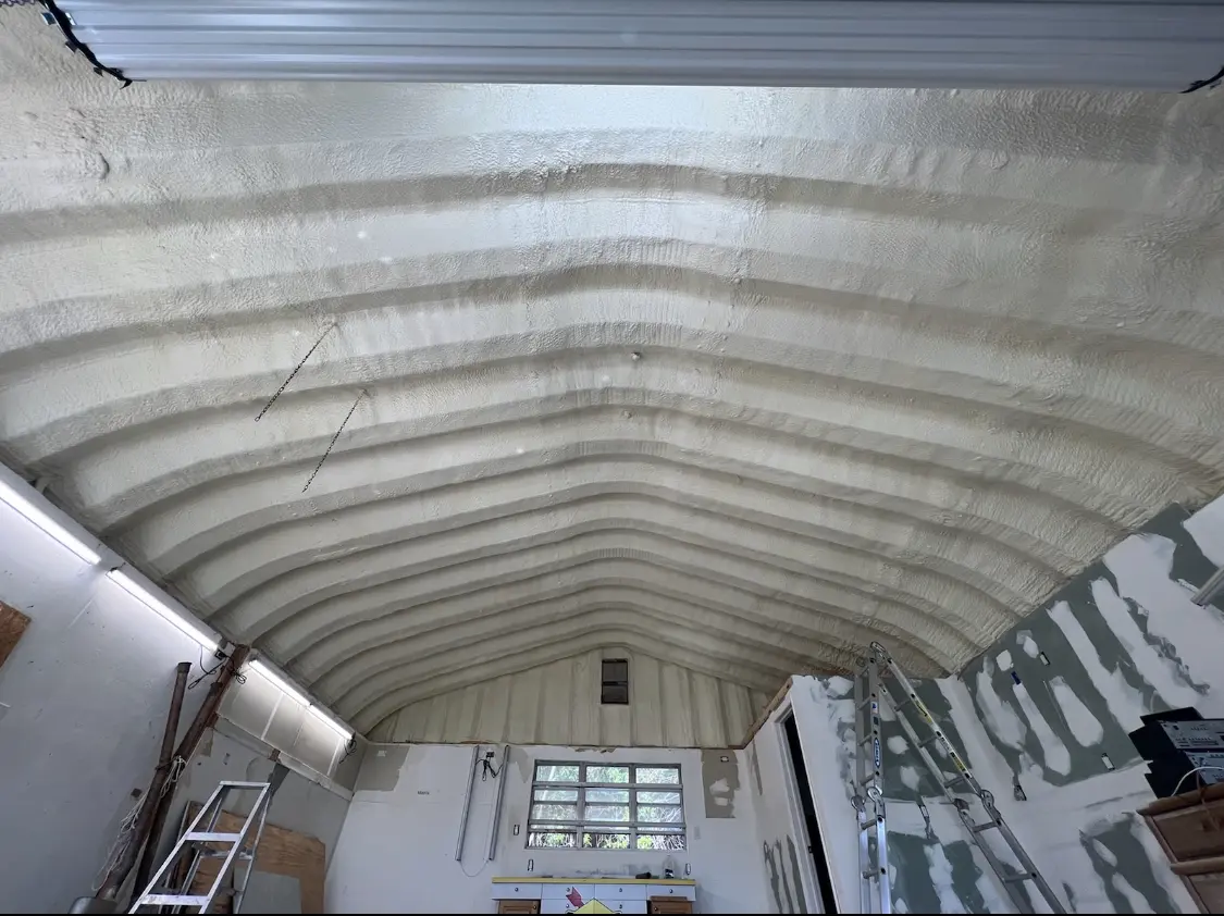 Spray polyurethane foam applied to the underside of a metal roof deck in Oakdale
